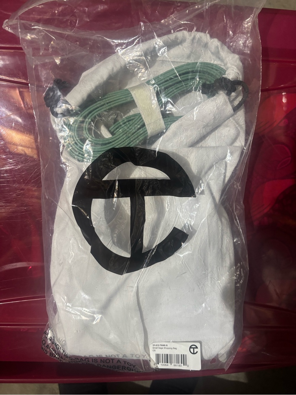 Telfar White Drawstring Pouch with Green Cable Included